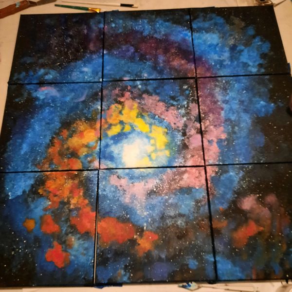 Colorful galaxy painting spread across nine canvases.