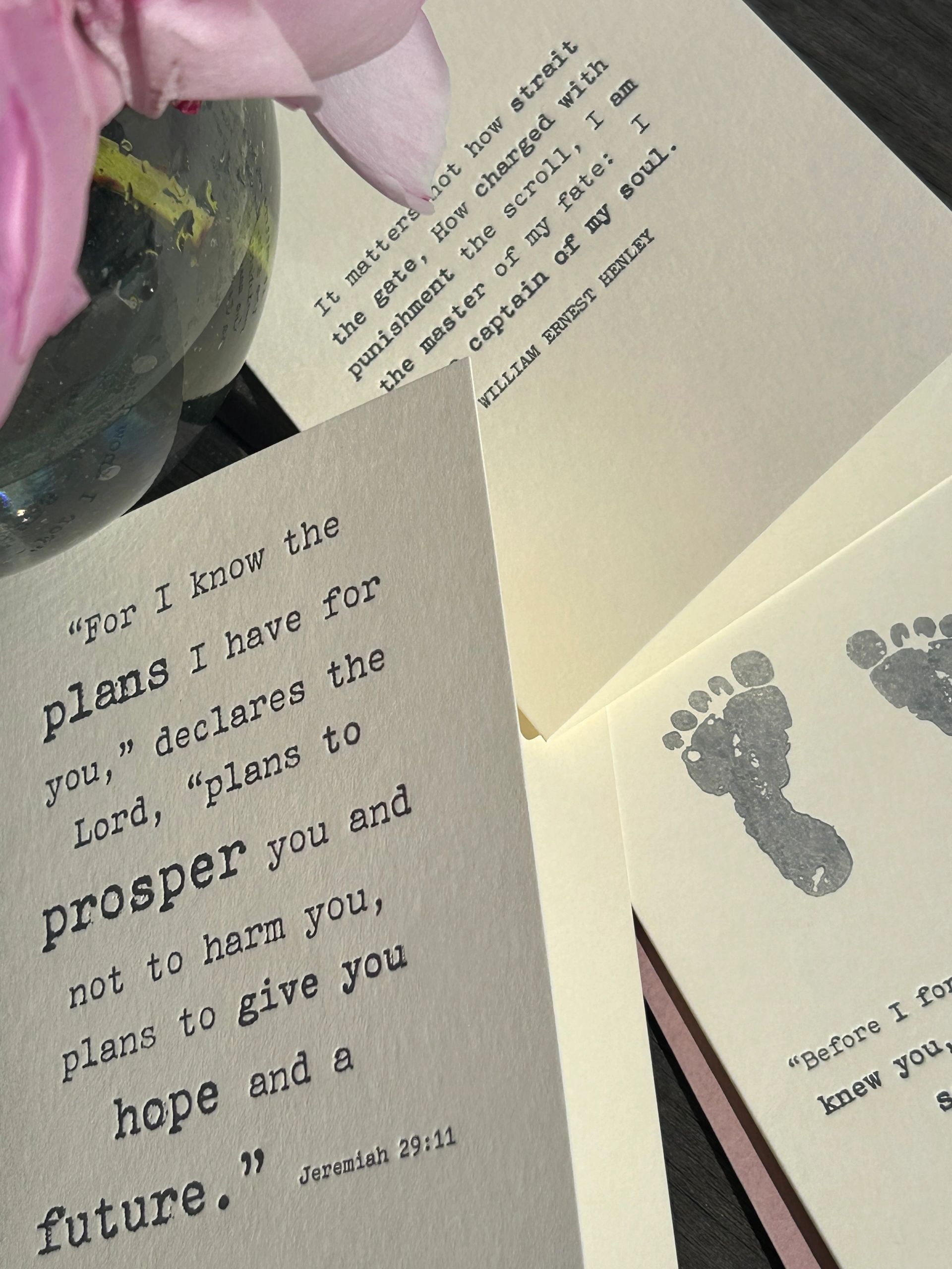 Bible verse printed on paper with pink flower and vase.