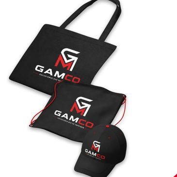 Black tote bag, pouch, and cap with GAMCO logo in white and red.