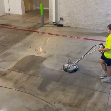 Commercial pressure washing in San Antonio, Texas. Pressure washing with surface cleaner.