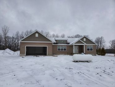 Photo of the front of the house plan the Branson.