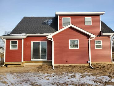 Image of the back of the two-story home the Brandi Maire.