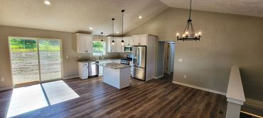 Open floor plan kitchen with island.