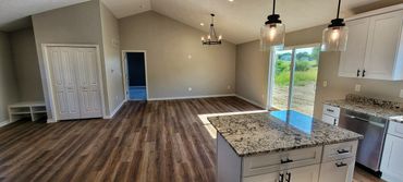 Open floor plan with vaulted ceilings