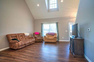 Livingroom tall ceilings in the Brandi Marie blueprint.