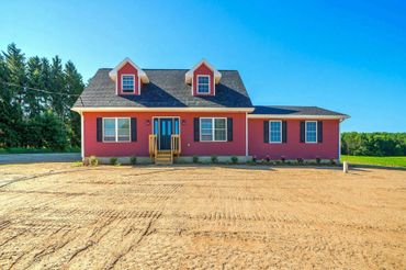 Front image of the two-story home the Brandi Marie.