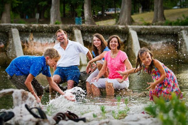 candid family portrait sessions with median river in Texas