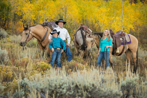 fall leaf photo session with horses and family: Colorado fall portrait session with horses