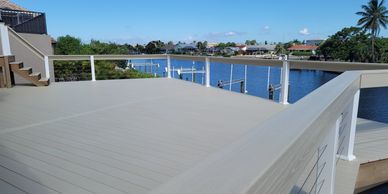 Grey deck overlooking water