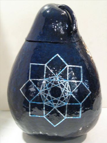 Large blue canister gourd with silver geometric designs