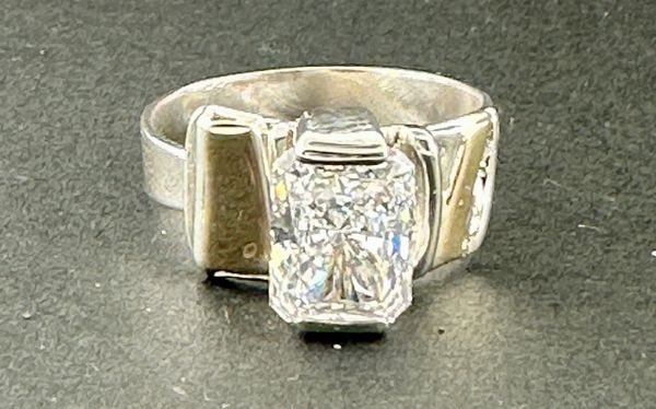 white topaz in ss and 14k gopld in an adjustable band as usual.