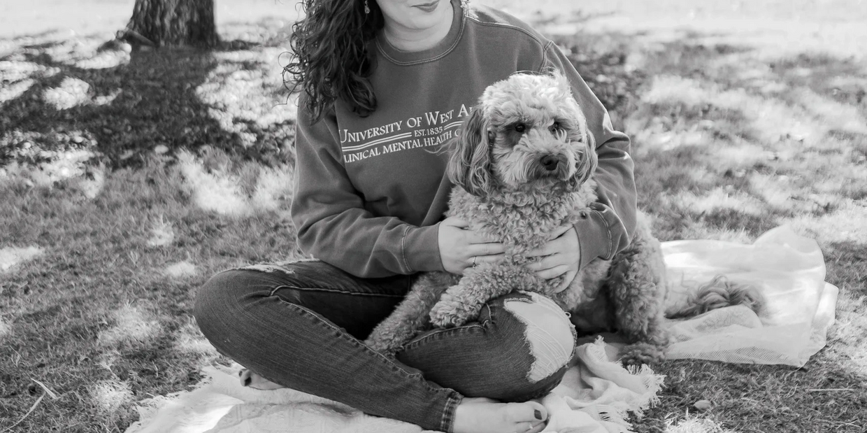 Erin McQueen and Lady the Therapy dog in training