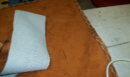 Coordinate welt is sewn to cushion