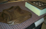Leather seat cushion is sewn