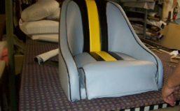 The upholstered seat cover