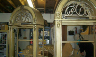 Original gilded blond Curio Cabinets