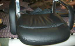 Arms and seat are re-upholstered
