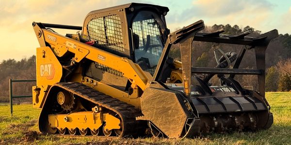 Cat 299D3 and HM316 Forestry mulching head in Delaware county Oklahoma