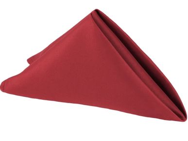 Red folded cloth napkin.