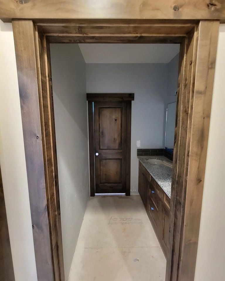 Stained trim and door.