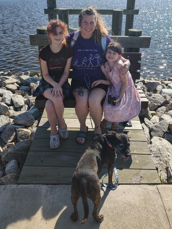 A photo of my daughter's, pup and myself