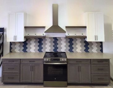 Two-toned cabinet options with GE Appliances in Slate color