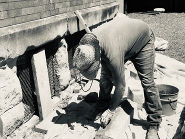 Support masonry structure and replace sandstone.