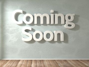 3D letters on wall spell 'Coming Soon'.