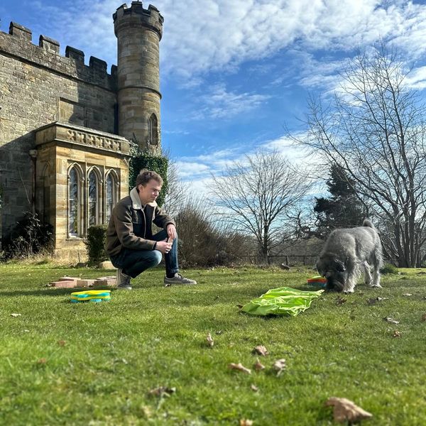 Daniel working with a schnauzer