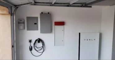 Level 2 EV charging installation using a weather resistant NEMA 14-50 EV rated receptacle installed