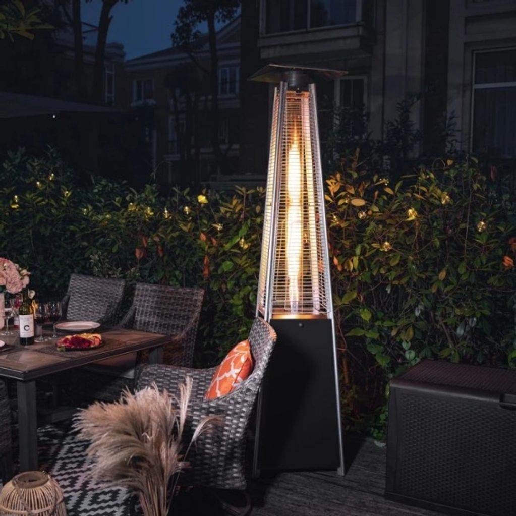 Glass tube patio heater with 1 full tank of propane.