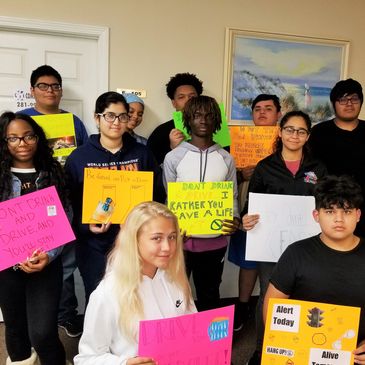 Teen drivers ed students completing their classroom instruction.