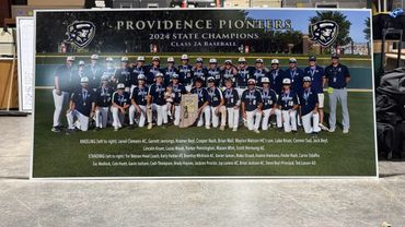 Providence Pioneers 2024 Class 2A Baseball State Champions team photo with players and coaches.