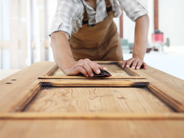 Man working on shutter
