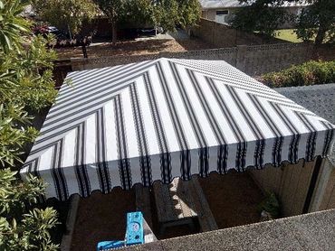 Steel framed fabric patio covers and gazebos offer shade anywhere in your backyard oasis!