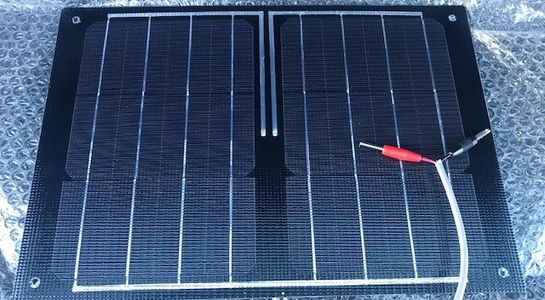 Photograph of solar panel showing cable ends