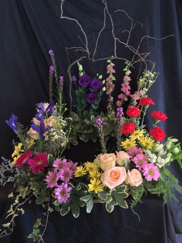 Funeral floral wreath to surround an urn.