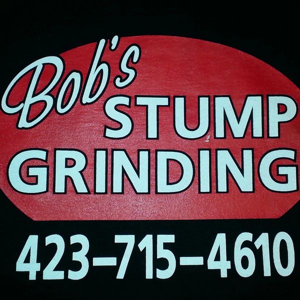 Sign for Bob's Stump Grinding with a contact number.