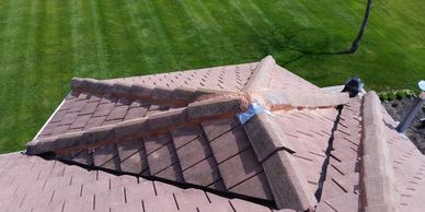 Marley tile roof with re cemented hips in Richmond hill, Ontario.