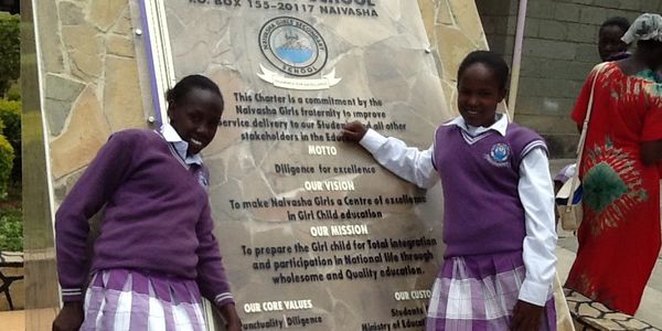 Cynthia and Nelly in front of the Naivasha Girls School Academy.