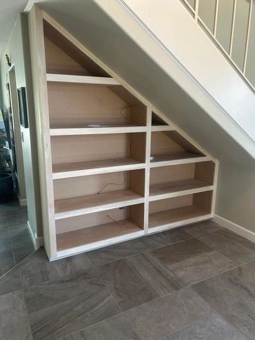 custom book shelves
under the stairs shelves
display shelves san fernando valley