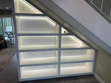 Custom shelf built-in in Westlake Village with clean lines and precise, modern carpentry.