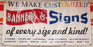 Large banner advertising customized signs.
