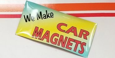 Shiny custom vehicle magnet sign.