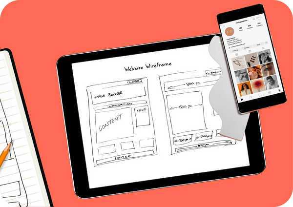 A tablet displaying a wireframe design next to a smartphone showing a social media feed.