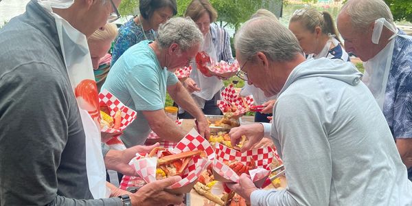 right after the shrimp boil is delivered to the table the guests can choose what they want to eat