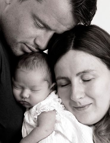 parents and newborn photo shoot