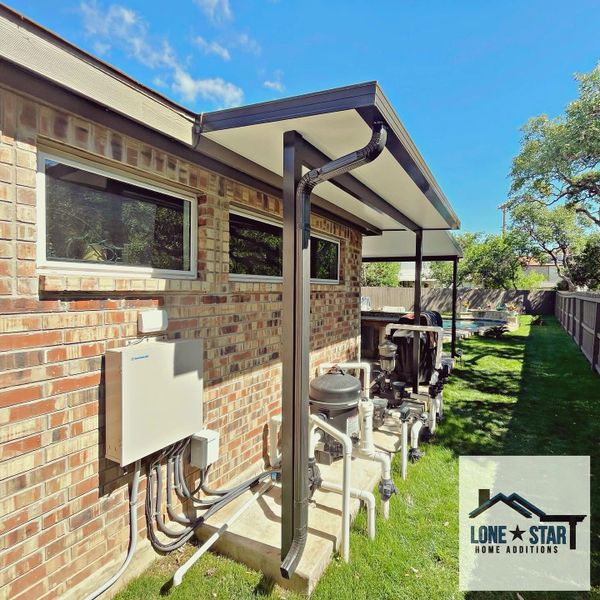 Patio cover was installed above a pool pump