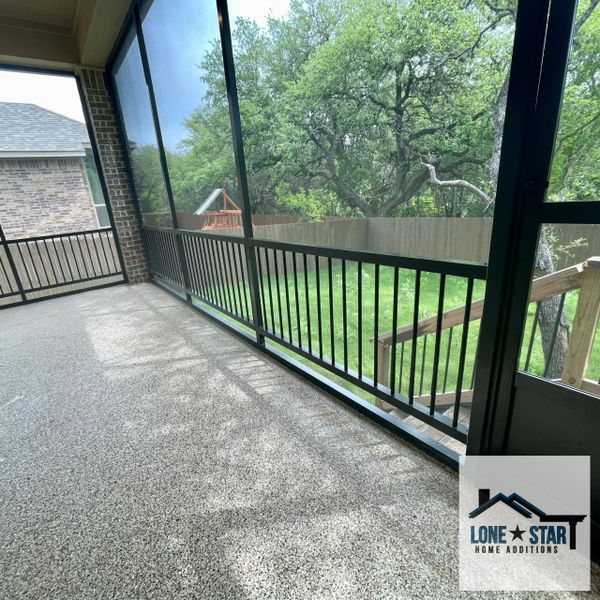 Vericle view of a patio enclosure and handrail system