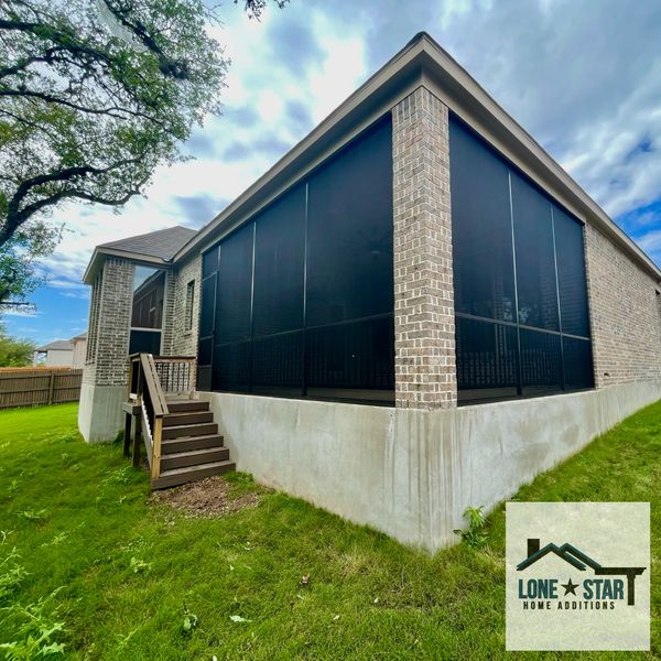 Outside view of a patio enclosure installed in San Antonio, Texas